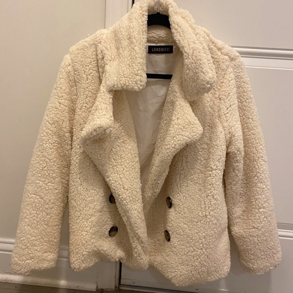 Sherpa like cream colored coat